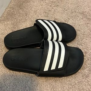 Black adidas slip ons